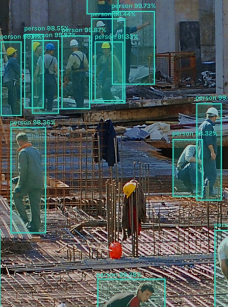 Construction site with AI vision detecting workers and safety compliance
